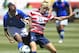 SANDY, UT - JUNE 30: Megan Rapinoe #15 of the USA and Robyn Gayle #5 of Canada fight for the ball during the second half of the women's Olympic send-off soccer match June 30, 2012 at Rio Tinto Stadium in Sandy, Utah. The USA beat Canada 2-1. (Photo by George Frey/Getty Images)