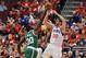 PHILADELPHIA, PA - MAY 16: Spencer Hawes #00 of the Philadelphia 76ers has a shot blocked by Brandon Bass #30 of the Boston Celtics in Game Three of the Eastern Conference Semifinals in the 2012 NBA Playoffs at the Wells Fargo Center on May 16, 2012 in Philadelphia, Pennsylvania. NOTE TO USER: User expressly acknowledges and agrees that, by downloading and or using this photograph, User is consenting to the terms and conditions of the Getty Images License Agreement. (Photo by Drew Hallowell/Getty Images)