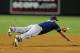 Chase Headley makes a diving attempt at a ground ball in a game against the Arizona Diamondbacks on July 3.