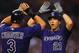 ST. LOUIS, MO - JULY 2: Tyler Colvin #21 of the Colorado Rockies is congratulated after hitting a two-run home run against the St. Louis Cardinals at Busch Stadium on July 2, 2012 in St. Louis, Missouri. (Photo by Dilip Vishwanat/Getty Images)