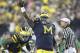 ANN ARBOR, MI - SEPTEMBER 10: William Campbell #73 of the University of Michigan celebrates after recovering a Notre Dame Irish fumble in the fourth quarter of the game at Michigan Stadium on September 10, 2011 in Ann Arbor, Michigan. The Wolverines defeated the Irish 35-31. (Photo by Leon Halip/Getty Images)
