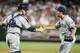 PHOENIX, AZ - JULY 04: Pitcher Huston Street #16 of the San Diego Padres is congratulated by catcher Yasmani Grandal following an 8-6 victory over the Arizona Diamondbacks in a MLB game at Chase Field on July 4, 2012 in Phoenix, Arizona. (Photo by Ralph Freso/Getty Images)
