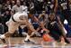 NEW YORK, NY - MARCH 07: Henry Sims #14 of the Georgetown Hoyas reaches for a loose ball against Tray Woodall #1 of the Pittsburgh Panthers during their second round game of the 2012 Big East Men's Basketball Tournament at Madison Square Garden on March 7, 2012 in New York City. (Photo by Jim McIsaac/Getty Images)