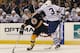 BOSTON, MA - MARCH 19: Dion Phaneuf #3 of the Toronto Maple Leafs hits Jordan Caron #38 of the Boston Bruins at the TD Garden on March 19, 2012 in Boston, Massachusetts. The Bruins defeated the Maple Leafs 8-0. (Photo by Bruce Bennett/Getty Images)