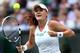 LONDON, ENGLAND - JULY 05: Agnieszka Radwanska of Poland celebrates match point during her Ladies' Singles semi final match against Angelique Kerber of Germany on day ten of the Wimbledon Lawn Tennis Championships at the All England Lawn Tennis and Croquet Club on July 5, 2012 in London, England. (Photo by Paul Gilham/Getty Images)