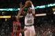 BOSTON, MA - JUNE 07: Ray Allen #20 of the Boston Celtics attempts a 3-point shot in the first quarter against Mario Chalmers #15 of the Miami Heat in Game Six of the Eastern Conference Finals in the 2012 NBA Playoffs on June 7, 2012 at TD Garden in Boston, Massachusetts. NOTE TO USER: User expressly acknowledges and agrees that, by downloading and or using this photograph, User is consenting to the terms and conditions of the Getty Images License Agreement. (Photo by Jim Rogash/Getty Images)
