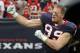 HOUSTON, TX - JANUARY 07: J.J. Watt #99 of the Houston Texans is introduced prior to the AFC Wildcard Playoff game against the Cincinnati Bengals on January 7, 2012 at Reliant Stadium in Houston, Texas. (Photo by Jamie Squire/Getty Images)
