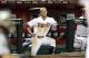 PHOENIX, AZ - JUNE 18: Aaron Hill #2 of the Arizona Diamondbacks watches from the dugout during the interleague MLB game at Chase Field on June 18, 2012 in Phoenix, Arizona. The Diamondbacks defeated the Mariners 7-1. (Photo by Christian Petersen/Getty Images)