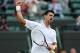 LONDON, ENGLAND - JULY 04: Novak Djokovic of Serbia celebrates match point during his Gentlemen's Singles quarter final match against Florian Mayer of Germany on day nine of the Wimbledon Lawn Tennis Championships at the All England Lawn Tennis and Croquet Club on July 4, 2012 in London, England. (Photo by Julian Finney/Getty Images)