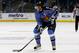 I know they didn't sign him from the Thrashers, I just love those blue jerseys.