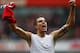 LONDON, ENGLAND - OCTOBER 16: Robin van Persie of Arsenal celebrates as he scores their second goal during the Barclays Premier League match between Arsenal and Sunderland at the Emirates Stadium on October 16, 2011 in London, England. (Photo by Paul Gilham/Getty Images)