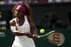 LONDON, ENGLAND - JULY 05: Serena Williams of the USA returns a shot during her Ladies' Singles semi final match against Victoria Azarenka of Belarus on day ten of the Wimbledon Lawn Tennis Championships at the All England Lawn Tennis and Croquet Club on July 5, 2012 in London, England. (Photo by Clive Brunskill/Getty Images)