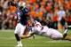AUBURN, AL - NOVEMBER 26: Michael Dyer #5 of the Auburn Tigers is tackled by Vinnie Sunseri #3 of the Alabama Crimson Tide at Jordan-Hare Stadium on November 26, 2011 in Auburn, Alabama. (Photo by Kevin C. Cox/Getty Images)