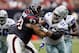 HOUSTON - SEPTEMBER 26: Tackle Eric Winston #73 of the Houston Texans locks up with defensive end Jason Hatcher #97 of the Dallas Cowboys during the fourth quarter at Reliant Stadium on September 26, 2010 in Houston, Texas. (Photo by Bob Levey/Getty Images)