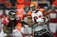 ATLANTA - OCTOBER 24: Terrell Owens #81 of the Cincinnati Bengals pulls in this reception against Curtis Lofton #50 of the Atlanta Falcons at Georgia Dome on October 24, 2010 in Atlanta, Georgia. (Photo by Kevin C. Cox/Getty Images)