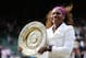 LONDON, ENGLAND - JULY 07: Serena Williams of the USA lifts the winners trophy and celebrates after her Ladies’ Singles final match against Agnieszka Radwanska of Poland on day twelve of the Wimbledon Lawn Tennis Championships at the All England Lawn Tennis and Croquet Club on July 7, 2012 in London, England. (Photo by Julian Finney/Getty Images)