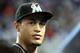 MIAMI, FL - JUNE 22: Giancarlo Stanton #27 of the Miami Marlins watches against the Toronto Blue Jays at Marlins Park on June 22, 2012 in Miami, Florida. Toronto defeated Miami 12-5. (Photo by Marc Serota/Getty Images)