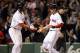 BOSTON, MA - MAY 02: Carl Crawford #13 of the Boston Red Sox celebrates with teammate Jacoby Ellsbury #2 after both scored on a hit by Dustin Pedroia in the fifth inning against the Los Angeles Angels on May 2, 2011 at Fenway Park in Boston, Massachusetts. (Photo by Elsa/Getty Images)