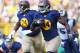 GREEN BAY, WI - OCTOBER 16: James Starks #44 of the Green Bay Packers runs up field against the St. Louis Rams at Lambeau Field on October 16, 2011 in Green Bay, Wisconsin. The Packers beat the Rams 24-3. (Photo by Dilip Vishwanat/Getty Images)