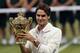 LONDON, ENGLAND - JULY 08: Roger Federer of Switzerland holds the winner's trophy after winning his Gentlemen's Singles final match against Andy Murray of Great Britain on day thirteen of the Wimbledon Lawn Tennis Championships at the All England Lawn Tennis and Croquet Club on July 8, 2012 in London, England. (Photo by Julian Finney/Getty Images)