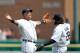DETROIT, MI - JULY 08: Miguel Cabrera #24 and Prince Fielder #28 of the Detroit Tigers celebrate a win over the Kansas City Royals at Comerica Park on July 8, 2012 in Detroit, Michigan. The Tigers defeated the Royals 7-1. (Photo by Leon Halip/Getty Images)