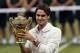 LONDON, ENGLAND - JULY 08: Roger Federer of Switzerland holds the winner's trophy after winning his Gentlemen's Singles final match against Andy Murray of Great Britain on day thirteen of the Wimbledon Lawn Tennis Championships at the All England Lawn Tennis and Croquet Club on July 8, 2012 in London, England. (Photo by Julian Finney/Getty Images)