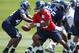 RENTON, WA - MAY 11: Quarterback Russell Wilson #3 of the Seattle Seahawks looks to hand off during minicamp at the Virginia Mason Athletic Center on May 11, 2012 in Renton, Washington. (Photo by Otto Greule Jr/Getty Images)