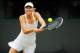 LONDON, ENGLAND - JULY 02: Maria Sharapova of Russia hits a backhand return during her Ladies' singles fourth round match against Sabine Lisicki of Germany on day seven of the Wimbledon Lawn Tennis Championships at the All England Lawn Tennis and Croquet Club on July 2, 2012 in London, England. (Photo by Paul Gilham/Getty Images)