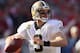 SAN FRANCISCO, CA - JANUARY 14: Drew Brees #9 of the New Orleans Saints looks to pass from the pocket against the San Francisco 49ers during the NFC Divisional playoff game at Candlestick Park on January 14, 2012 in San Francisco, California. The 49ers won the game 36-32. (Photo by Ezra Shaw/Getty Images)