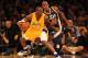 LOS ANGELES, CA - DECEMBER 27: Kobe Bryant #24 of the Los Angeles Lakers controls the ball against Raja Bell #19 of the Utah Jazz at Staples Center on December 27, 2011 in Los Angeles, California. NOTE TO USER: User expressly acknowledges and agrees that, by downloading and or using this photograph, User is consenting to the terms and conditions of the Getty Images License Agreement. (Photo by Stephen Dunn/Getty Images)