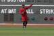 BOSTON, MA - JULY 7: Carl Crawford #13 completes some drills in the outfield before the second game of a doubleheader with the New York Yankees at Fenway Park July 7, 2012 in Boston, Massachusetts. Crawford has been removed from his minor league rehab assignment with a mild left groin strain.(Photo by Jim Rogash/Getty Images)