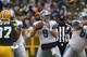 GREEN BAY, WI - JANUARY 01: Matthew Stafford #9 of the Detroit Lions drops back to pass against the Green Bay Packers at Lambeau Field on January 1, 2012 in Green Bay, Wisconsin. The Packers defeated the Lions 45-41. (Photo by Jonathan Daniel/Getty Images)