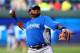 KANSAS CITY, MO - JULY 09: National League All-Star Pablo Sandoval #48 of the San Francisco Giants throws the ball during the Gatorade All-Star Workout Day at Kauffman Stadium on July 9, 2012 in Kansas City, Missouri. (Photo by Dilip Vishwanat/Getty Images)
