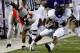 LAS VEGAS - OCTOBER 30: Ed Wesley #34 of the Texas Christian University Horned Frogs runs for yardage after getting away from Will Chandler #1 of the UNLV Rebels during the first quarter of their game at Sam Boyd Stadium October 30, 2010 in Las Vegas, Nevada. TCU won 48-6. (Photo by Ethan Miller/Getty Images)