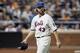 NEW YORK, NY - JULY 05: R.A. Dickey #43 of the New York Mets walks to the dugout after getting out of the seventh inning against the Philadelphia Phillies at Citi Field on July 5, 2012 in the Flushing neighborhood of the Queens borough of New York City. (Photo by Jim McIsaac/Getty Images)