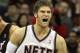 NEWARK, NJ - APRIL 03: Brook Lopez #11 of the New Jersey Nets reacts against the Miami Heat at the Prudential Center on April 3, 2011 in Newark, New Jersey.The Heat defeated the Nets 108-94.NOTE TO USER: User expressly acknowledges and agrees that, by downloading and/or using this Photograph, user is consenting to the terms and conditions of the Getty Images License Agreement. (Photo by Jim McIsaac/Getty Images)