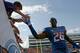 BOISE, ID - OCTOBER 01: Quaylon Ewing-Burton #26 of the Boise State Broncos greets fans after the game against the Nevada Wolf Pack at Bronco Stadium on October 1, 2011 in Boise, Idaho. (Photo by Otto Kitsinger III/Getty Images)