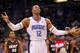 ORLANDO, FL - DECEMBER 21: Dwight Howard #12 of the Orlando Magic argues a call during a preseason game against the Miami Heat at Amway Center on December 21, 2011 in Orlando, Florida. NOTE TO USER: User expressly acknowledges and agrees that, by downloading and/or using this Photograph, User is consenting to the terms and conditions of the Getty Images License Agreement. (Photo by Mike Ehrmann/Getty Images)