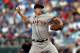 KANSAS CITY, MO - JULY 10: National League All-Star Matt Cain #18 of the San Francisco Giants pitches in the first inning during the 83rd MLB All-Star Game at Kauffman Stadium on July 10, 2012 in Kansas City, Missouri. (Photo by Jonathan Daniel/Getty Images)