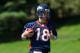 ENGLEWOOD, CO - MAY 21: Quarterback Peyton Manning #18 of the Denver Broncos runs with the ball during organized team activities at Dove Valley on May 21, 2012 in Englewood, Colorado. (Photo by Justin Edmonds/Getty Images)