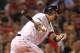 BOSTON, MA - MAY 30: Adrian Gonzalez #28 of the Boston Red Sox doubles to knock in the go-ahead run in the seventh ining against the Detroit Tigers at Fenway Park May 30, 2012 in Boston, Massachusetts. (Photo by Jim Rogash/Getty Images)
