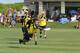 HONOLULU, HAWAII - AUGUST 10: A member of team Death or Glory (DoG) from Boston dives for the disk during the men's open championship game against Santa Barbara's team Condor. Team Condor defeated DoG 14-12 for the title in Honolulu, Hawaii on August 10, 2002. 120 teams from 24 countries compete for World Champion honors in four divisions of Ultimate Frisbee. (Photo by Phil Mislinski/Getty Images)