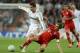 MADRID, SPAIN - APRIL 25: Philipp Lahm of Bayern Munich tackles Cristiano Ronaldo of Real Madrid during the UEFA Champions League Semi Final second leg between Real Madrid CF and Bayern Munich at The Bernabeu Stadium on April 25, 2012 in Madrid, Spain. (Photo by Jasper Juinen/Getty Images)