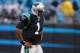 CHARLOTTE, NC - NOVEMBER 13: Cam Newton #1 of the Carolina Panthers walks off the field dejected during their game against the Tennessee Titans at Bank of America Stadium on November 13, 2011 in Charlotte, North Carolina. (Photo by Streeter Lecka/Getty Images)