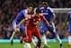 LIVERPOOL, ENGLAND - MAY 08: Oriol Romeu of Chelsea and Michael Essien of Chelsea close down Luis Suarez of Liverpool during the Barclays Premier League match between Liverpool and Chelsea at Anfield on May 8, 2012 in Liverpool, England. (Photo by Alex Livesey/Getty Images)