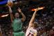 MIAMI, FL - APRIL 10: Jeff Green #8 of the Boston Celtics shoots over Mike Miller #13 of the Miami Heat during a game at American Airlines Arena on April 10, 2011 in Miami, Florida. NOTE TO USER: User expressly acknowledges and agrees that, by downloading and/or using this Photograph, User is consenting to the terms and conditions of the Getty Images License Agreement. (Photo by Mike Ehrmann/Getty Images)