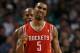BOSTON, MA - JANUARY 10: Courtney Lee #5 of the Houston Rockets celebrates a shot against the Boston Celtics on January 10, 2011 at the TD Garden in Boston, Massachusetts. The Rockets defeated the Celtics 108-102. NOTE TO USER: User expressly acknowledges and agrees that, by downloading and/or using this Photograph, User is consenting to the terms and conditions of the Getty Images License Agreement. (Photo by Elsa/Getty Images)