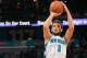 NEW ORLEANS, LA - JANUARY 06: Marco Belinelli #8 of the New Orleans Hornets shoots the ball over Ty Lawson #3 of the Denver Nuggets at New Orleans Arena on January 6, 2012 in New Orleans, Louisiana. NOTE TO USER: User expressly acknowledges and agrees that, by downloading and or using this photograph, User is consenting to the terms and conditions of the Getty Images License Agreement. (Photo by Chris Graythen/Getty Images)