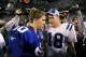 EAST RUTHERFORD, NJ - SEPTEMBER 10: Quarterback Eli Manning #10 of the New York Giants (L) congratulates his brother quarterback Peyton Manning #18 of the Indianapolis Colts on his 26-21 victory on September 10, 2006 at Giants Stadium in East Rutherford, New Jersey. (Photo by Travis Lindquist/Getty Images)