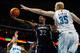 NEW ORLEANS, LA - JANUARY 18: O.J. Mayo #32 of the Memphis Grizzlies shoots the ball around Chris Kaman #35 of the New Orleans Hornets at New Orleans Arena on January 18, 2012 in New Orleans, Louisiana. NOTE TO USER: User expressly acknowledges and agrees that, by downloading and or using this photograph, User is consenting to the terms and conditions of the Getty Images License Agreement. (Photo by Chris Graythen/Getty Images)
